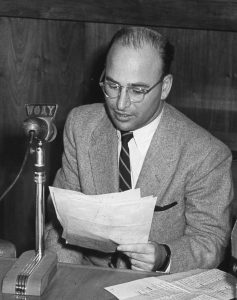 Brechner during an NBC radio broadcast, 1941.